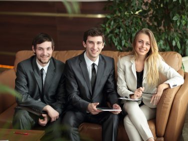 close up.business colleagues discuss sitting in the lobby of the office.office weekdays